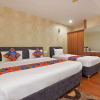 Отель FabHotel Dhanvitha Suites, фото 2