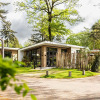 Отель Well-kept chalet with microwave, in a holiday park in the middle of De Veluwe, фото 49