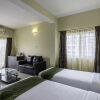 Отель Treebo Trend Daffodil Suites, фото 6