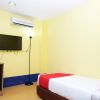 Отель OYO 89352 Golden Terminal Lodge, фото 7