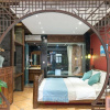 Отель Floral Hotel · He Lu Ju Lijiang, фото 9