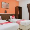 Отель OYO 589 Hotel Desa Puri Syariah, фото 5