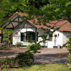 Отель Bungalow With a Terrace at Bedafse Bergen, фото 1