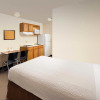 Отель WoodSpring Suites Des Moines Pleasant Hill, фото 3