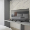 Отель Cozy And Well Designed Studio Serpong Garden Apartment, фото 3
