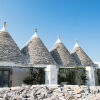 Отель Nina Trulli Resort, фото 1