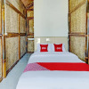 Отель OYO 90225 Rumah Bambu Trawas syariah, фото 6
