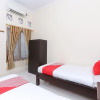 Отель OYO 1680 Dahlia Guesthouse, фото 7