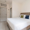 Отель Urbanview Hotel Minongga Pondok Labu by RedDoorz, фото 4