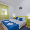 Отель Holiday House with Private Pool for 4-6 Persons in the Holiday Park Jelovci, фото 5