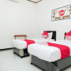 Отель OYO 353 Loesje Guest House Syariah, фото 19