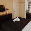 Отель Azure Urban Resort 3 Bedroom Suite, фото 26