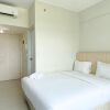 Отель Modern Look Studio At Springlake Summarecon Bekasi Apartment, фото 2