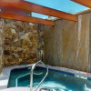 Отель Exclusive 4 Bedroom Ski in, Ski out Vacation Rental With Hot Tubs and Heated Outdoor Pool in Lionshe, фото 14