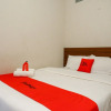 Отель Kost Harmoni by RedDoorz, фото 15