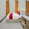 Отель OYO 92209 Kanggo Riko Family Homestay, фото 6