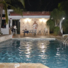 Отель Isabela Villa sleeps 40, pool, Jacuzzi, BBQ, power plant, volley, pool table, фото 16