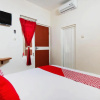 Отель Super OYO 3350 Cozy Residence Syariah, фото 8