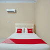 Отель OYO 93033 Mutiara Homestay Syariah, фото 7