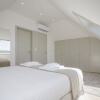 Отель Liiiving - Luxury Beachfront Apartment V, фото 11