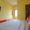 Отель Triantama Kost Syariah by OYO Rooms, фото 2
