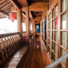 Отель Lijiang Dahuamao Inn, фото 6