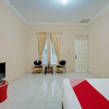 Отель OYO 93033 Mutiara Homestay Syariah, фото 11