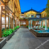 Отель Jiuqi Ouyu Inn, фото 1