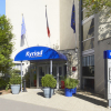 Отель Kyriad Paris Nord Porte de St Ouen в Сент-Уэн