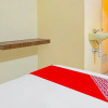 Отель OYO 709 Menjangan Residence at Klayatan, фото 24