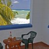 Отель Carib Beach Apartments, фото 6