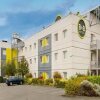 Отель B&B HOTEL Douai Parc des Expos Cuincy, фото 1