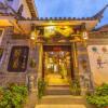 Отель Lijiang Yinyiju Inn, фото 1