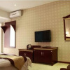 Отель Xishuangbanna Zhongrui Business Hotel, фото 2