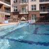 Отель Recently Upgraded Apt with gym and pool, фото 15