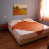 Отель Comfortable Apartment With AC at 3.5 km. From the Beach, фото 3