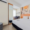 Отель Homey And Comfort Studio Apartment At B Residence, фото 5