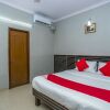 Отель OYO Flagship 18338 White Fort, фото 4