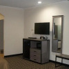 Отель Woodland Inn and Suites, фото 6