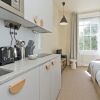 Отель Cosy Studio in Grade 2 Listed NW London Terrace, фото 11