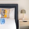 Отель Delightful two bed 5 Stars Apartment by Ideal Homes, фото 2