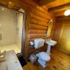 Отель Woodpecker Log Cabin with hot tub, pizza oven bbq entertainment area, lakeside with private fishing , фото 10