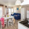 Отель Comfortable apartment with a microwave nearby the beach, фото 2