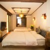 Отель Lijiang Tianlong Inn, фото 3
