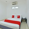 Отель OYO 90879 Eleven Inn, фото 6