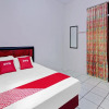 Отель OYO 90543 An-nur Guest House Syariah, фото 21