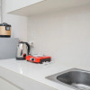 Отель Minimalist and Relaxing Studio Apartment at Springwood Residence, фото 11