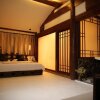 Отель Lijiang Passing Through Hostel, фото 15