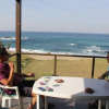 Отель On the beach living! 12 Calamari, фото 11
