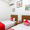 Отель OYO 1242 Penginapan Rb Syariah, фото 26